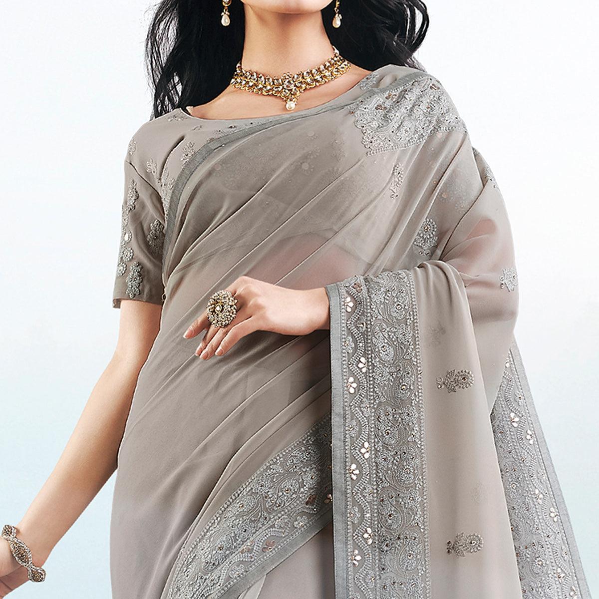 Flattering Grey Colored Partywear Embroidered Georgette Saree - Peachmode