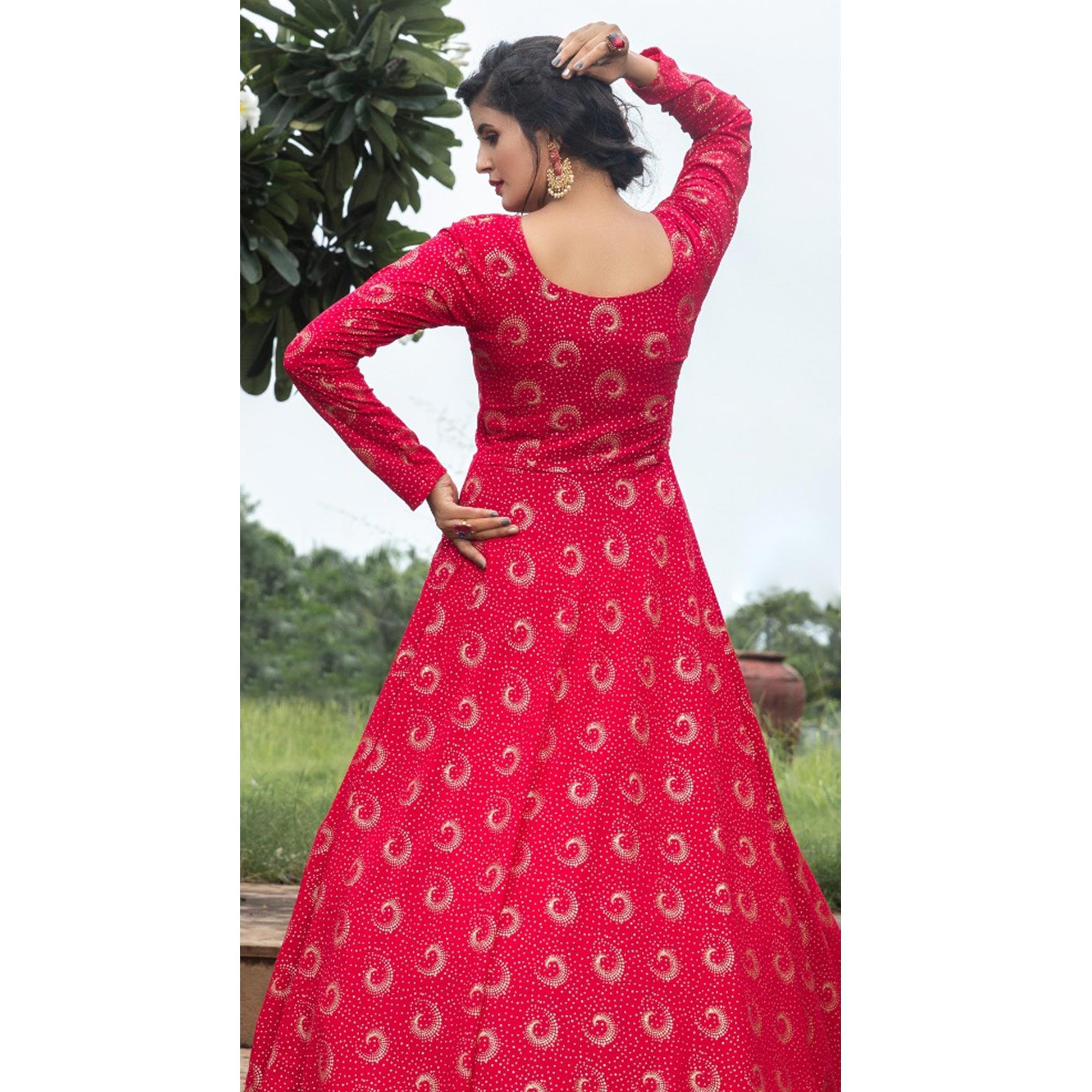 Flattering Pink Colored Party Wear Foil Printed Georgette Gown - Peachmode