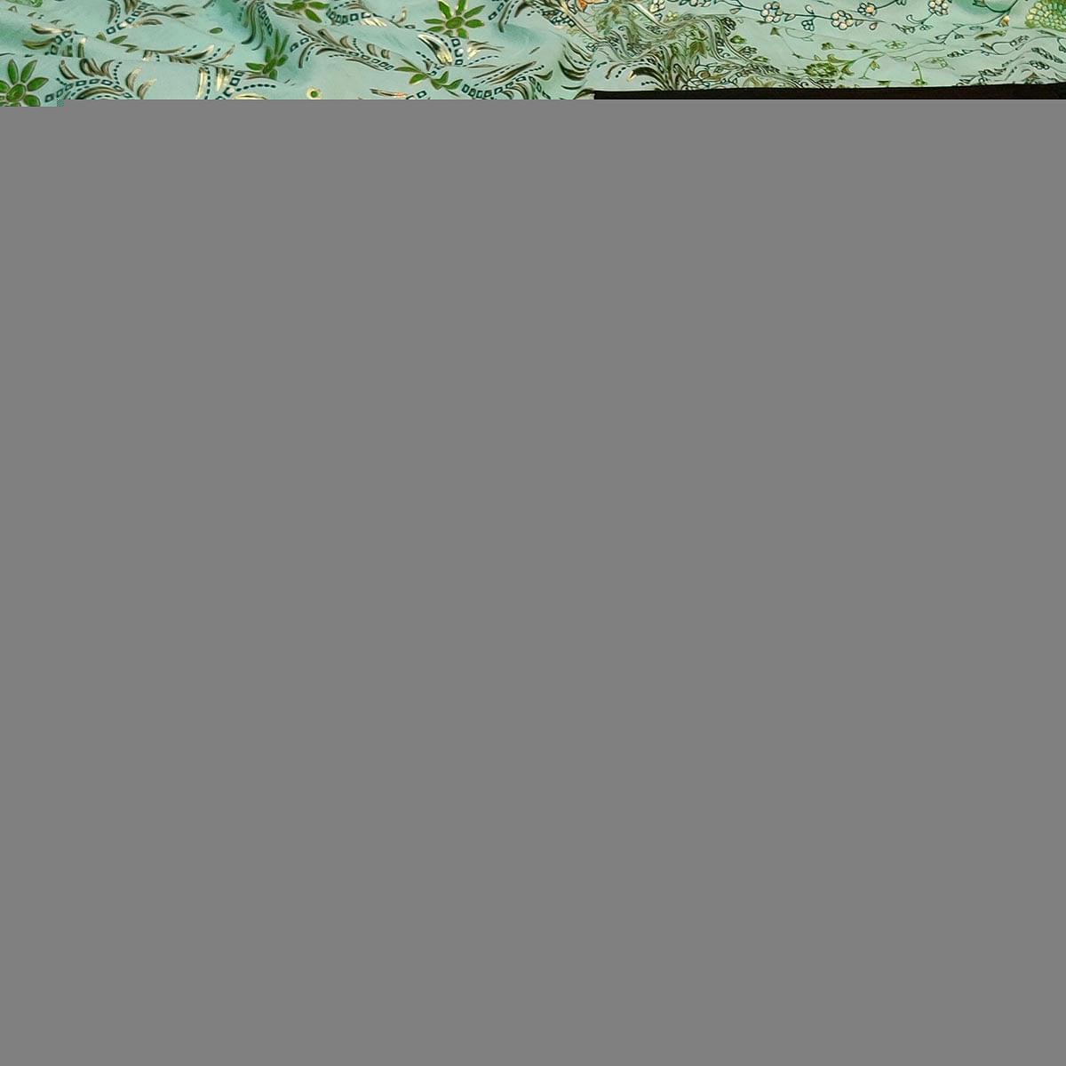 Flattering Sea Green Colored Festive Wear Printed Dola Silk Saree - Peachmode