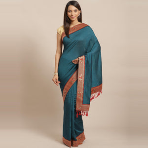 Flattering Teal Blue Colored Festive Woven Silk Blend Saree - Peachmode
