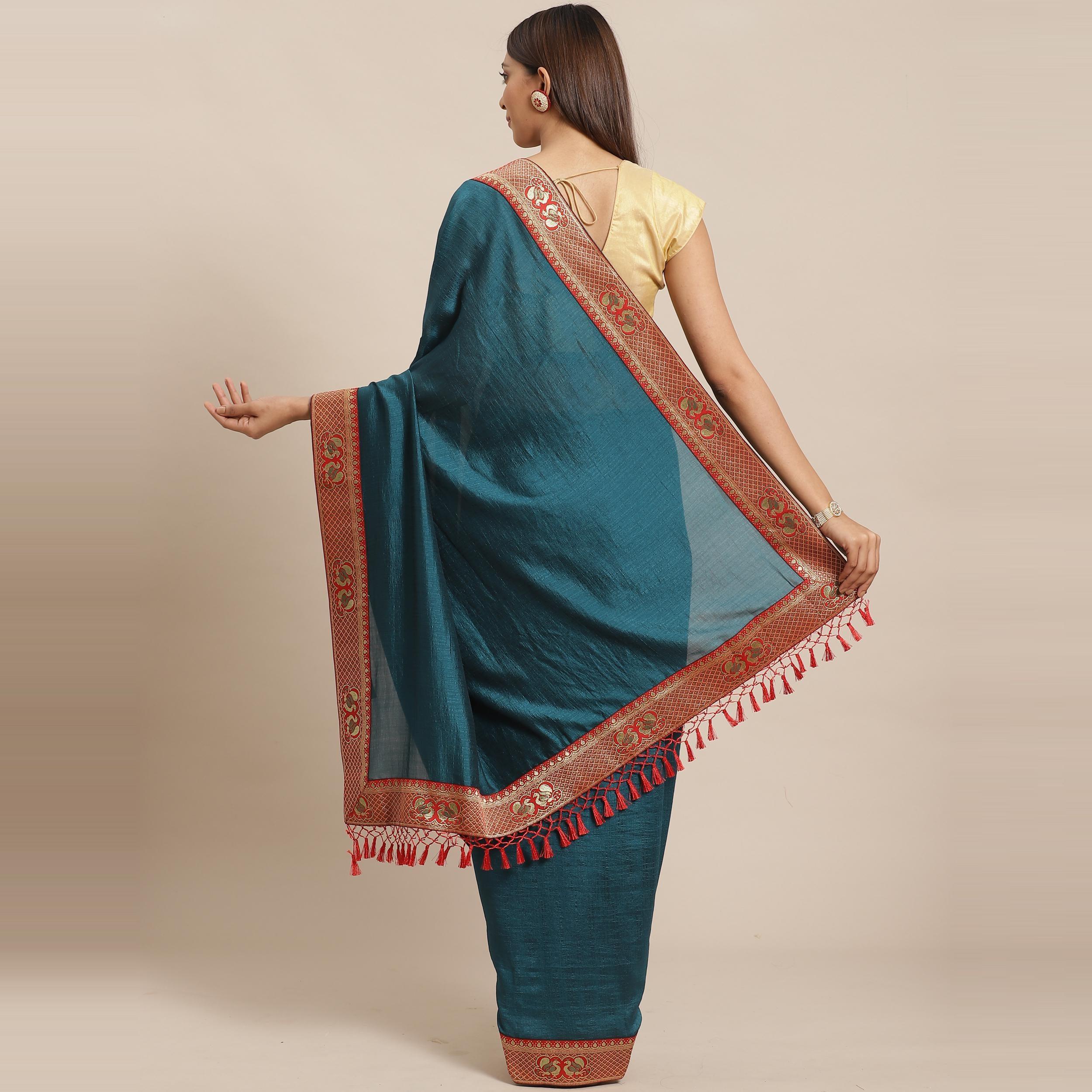 Flattering Teal Blue Colored Festive Woven Silk Blend Saree - Peachmode