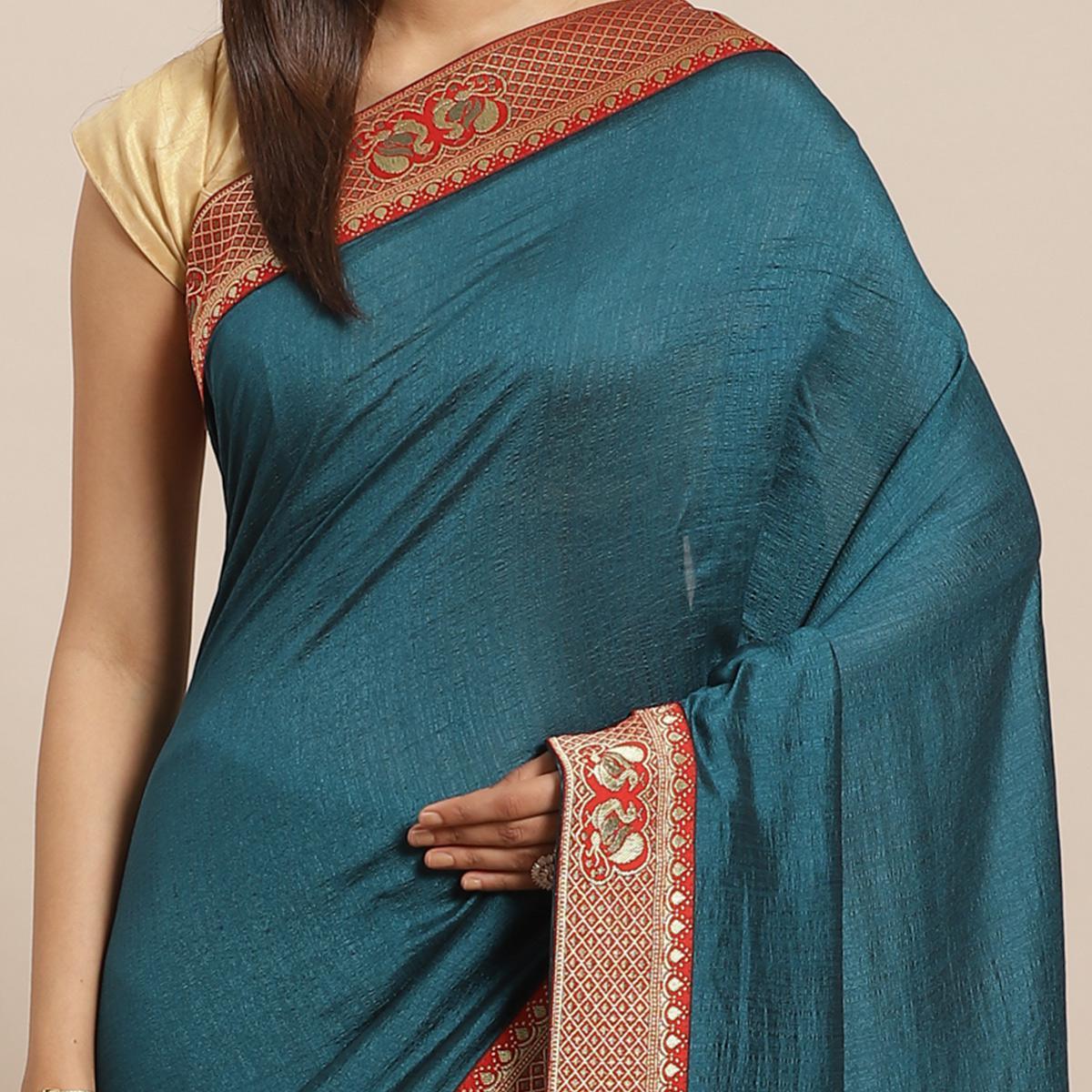 Flattering Teal Blue Colored Festive Woven Silk Blend Saree - Peachmode