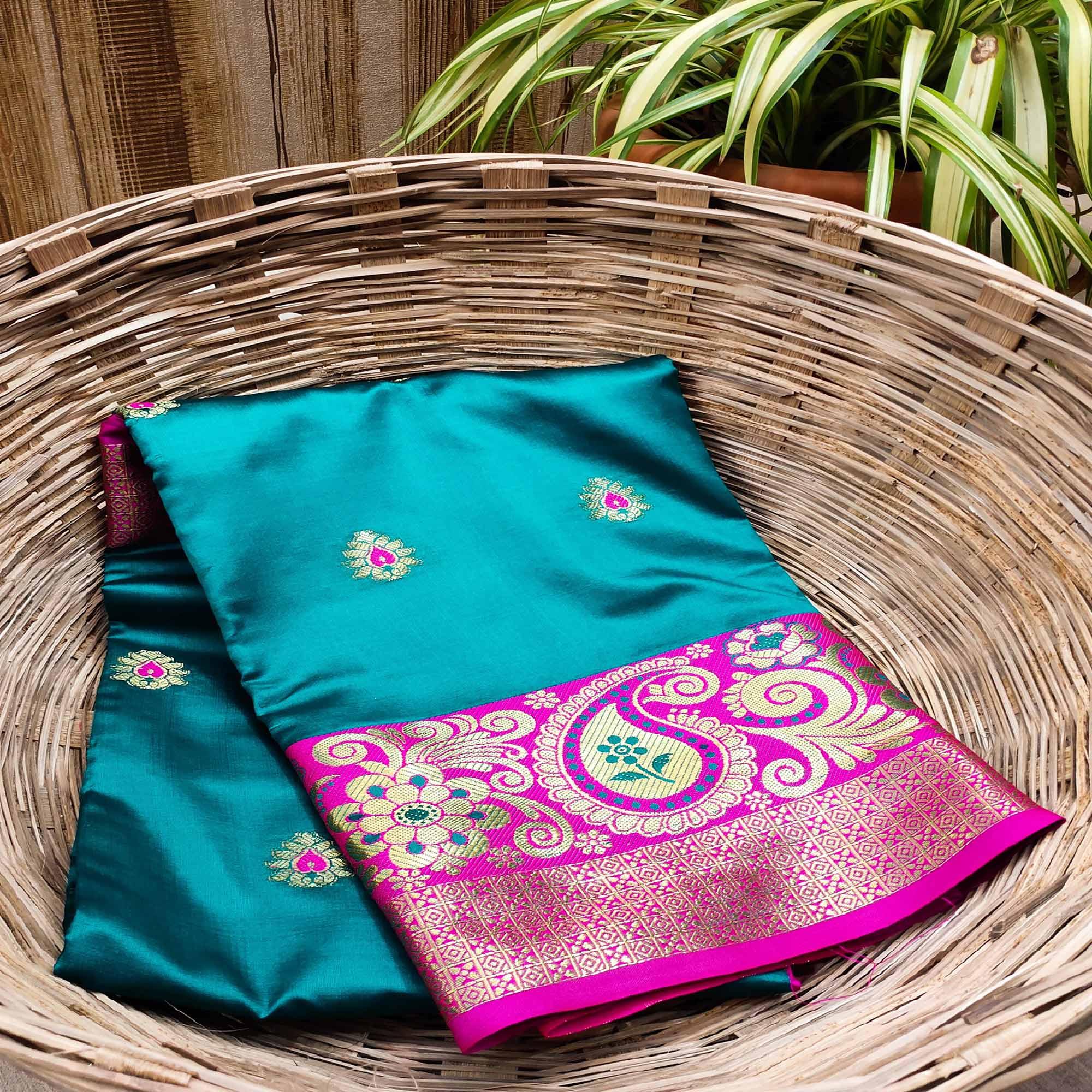 Flattering Turquoise Blue Colored Festive Wear Woven Kanjivaram Silk Saree - Peachmode