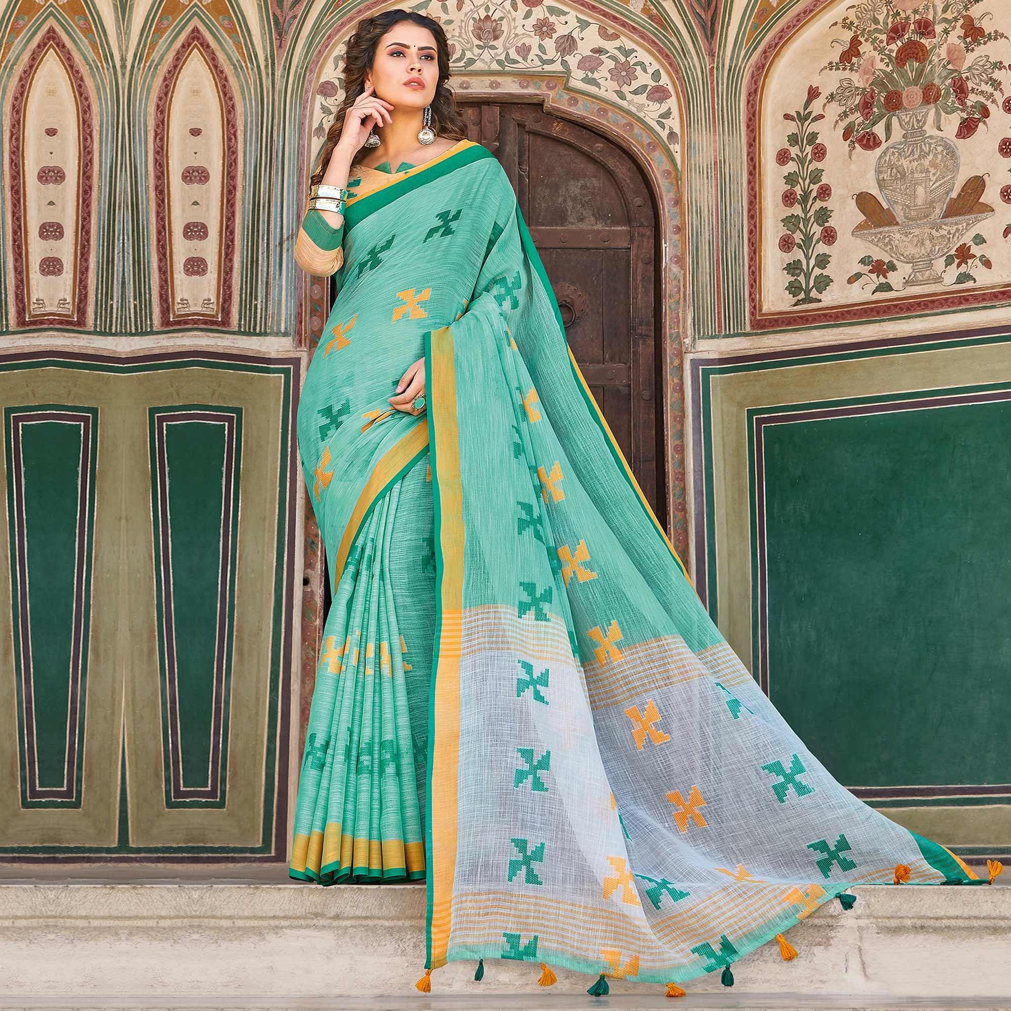 Flattering Turquoise Green Colored Casual Printed Linen Cotton Saree With Tassels - Peachmode