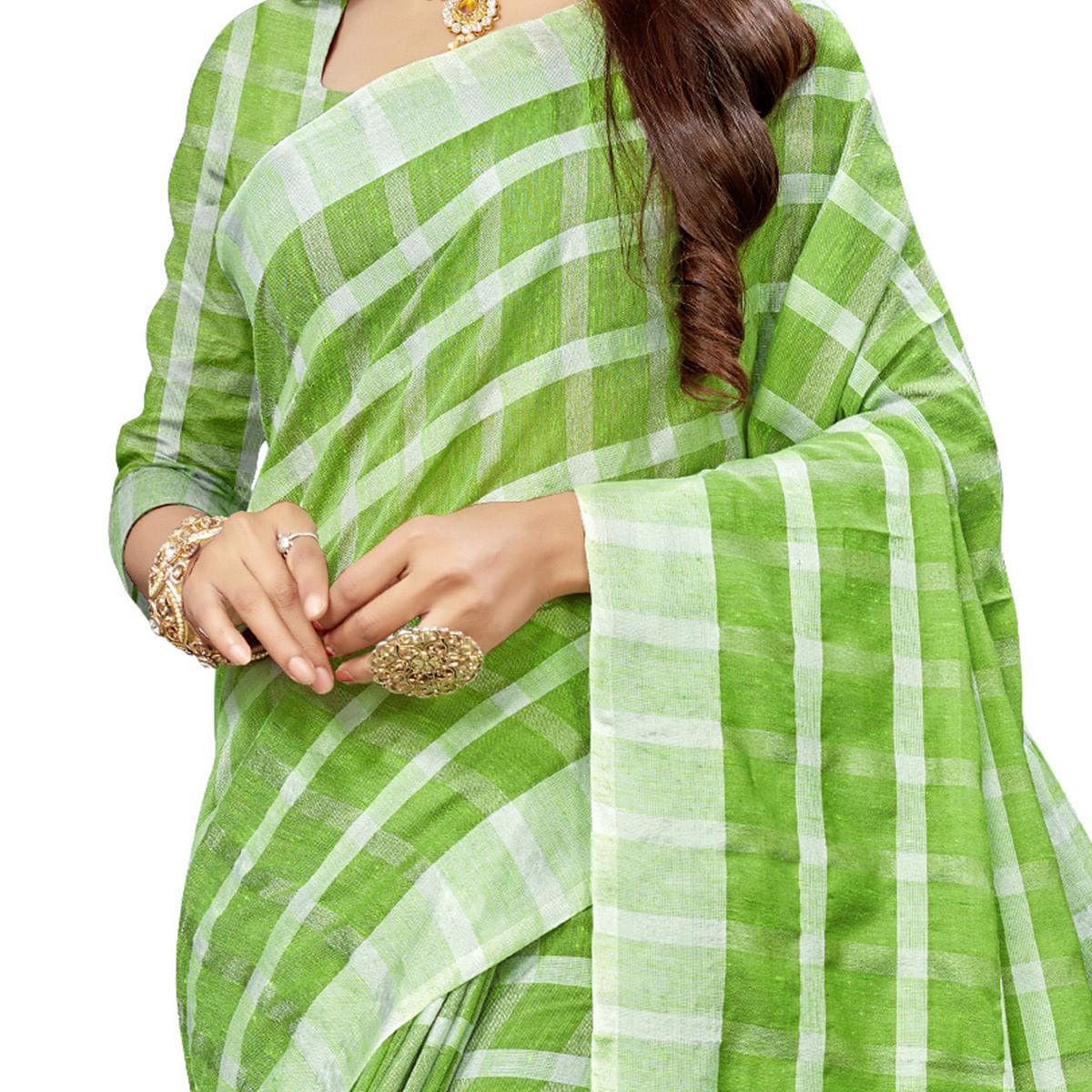 Flaunt Green Colored Fesive Wear Checks Print Cotton Silk Saree With Tassels - Peachmode