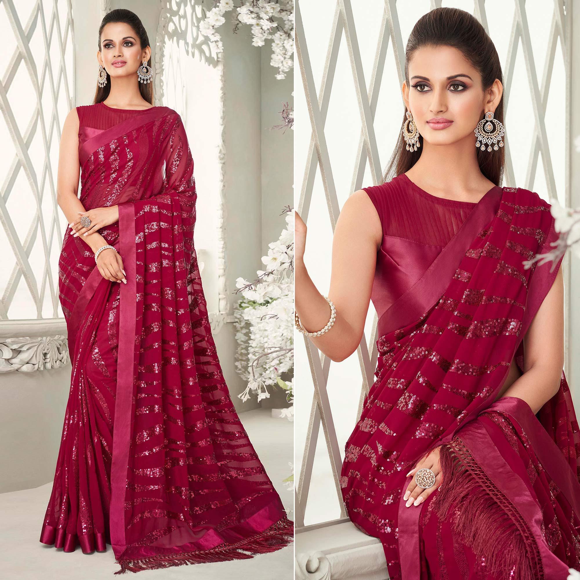Fuchsia Pink Sequence Embroidered Georgette Saree With Tassels - Peachmode