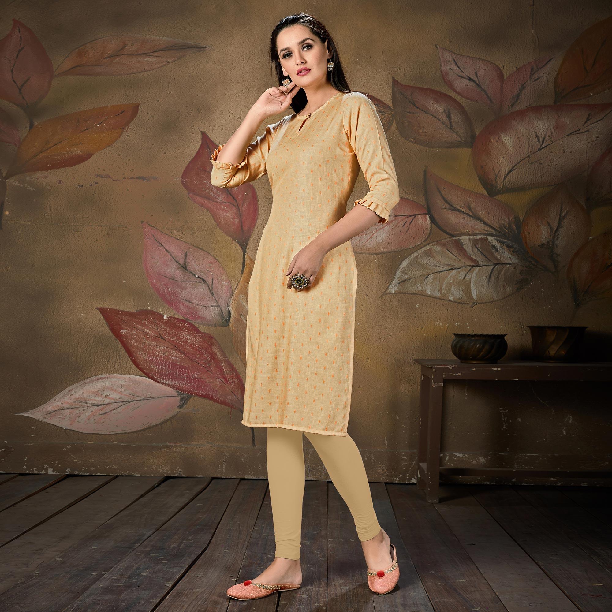 Gleaming Light Peach Colored Casual Embroidered Cotton Kurti - Peachmode