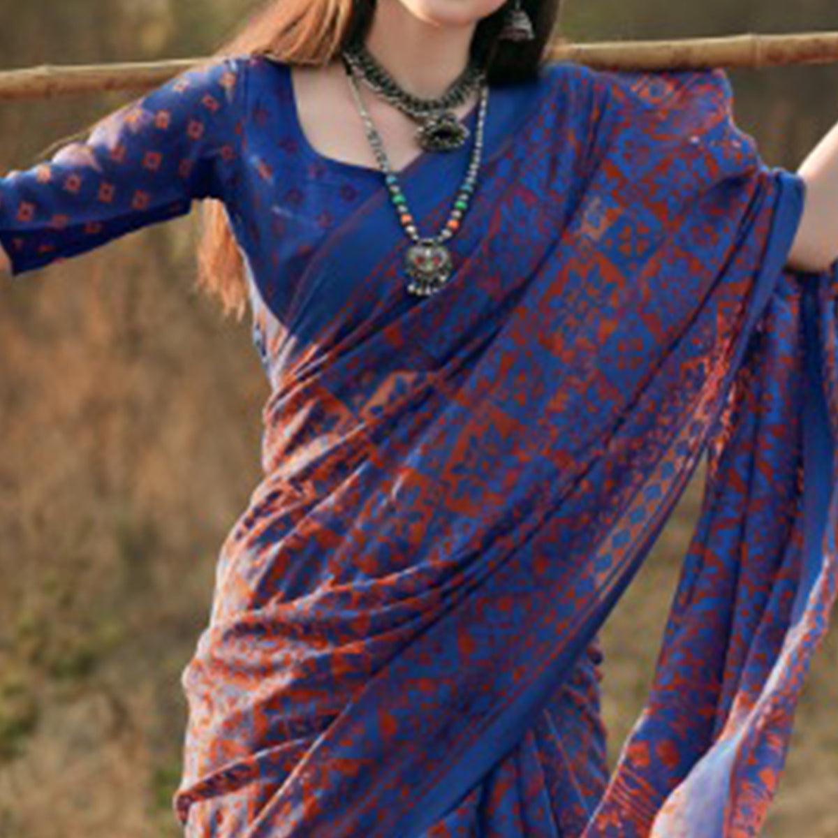 Glorious Blue Colored Casual Wear Printed Brasso Saree - Peachmode