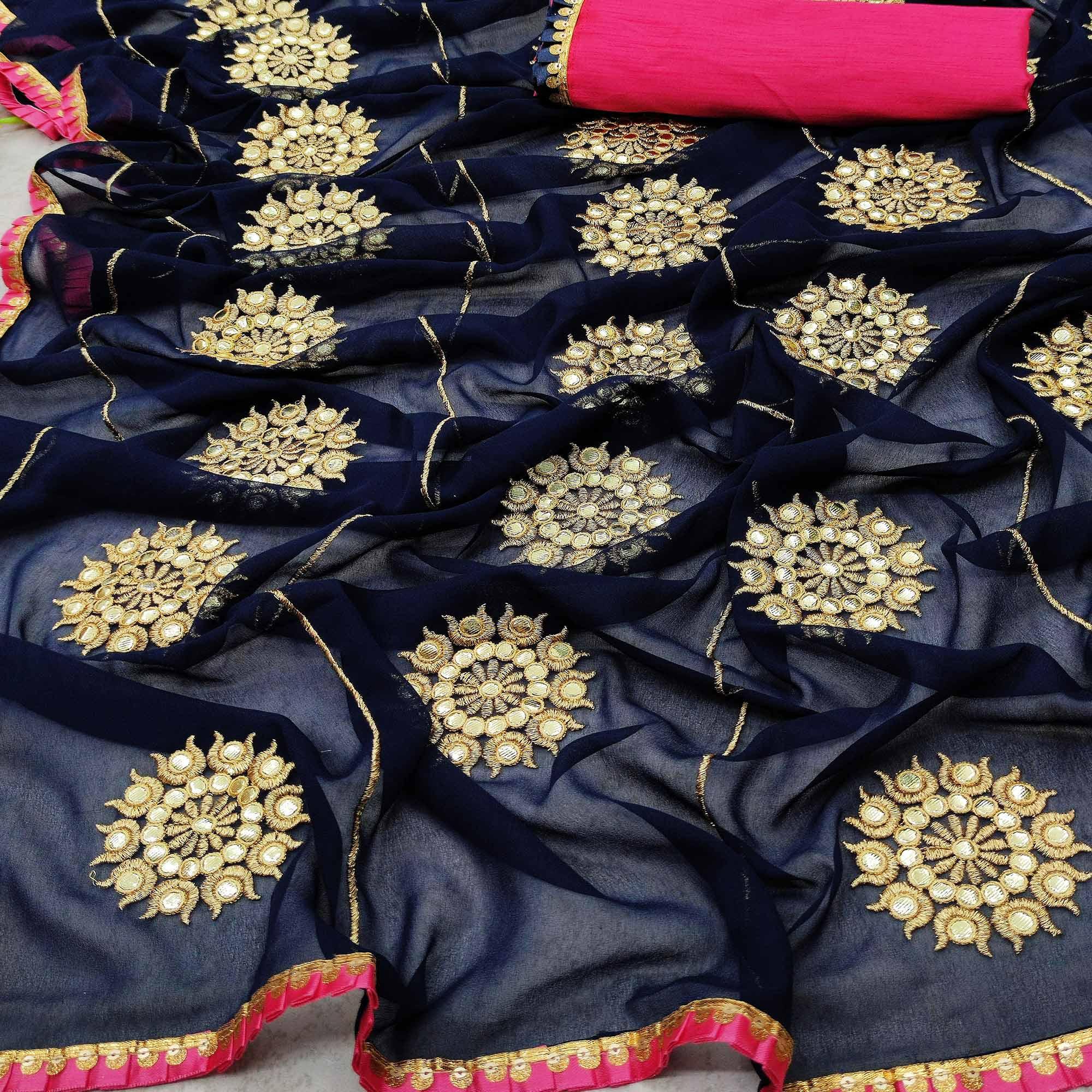 Glorious Dark Blue Colored Partywear Embroidered Georgette Saree - Peachmode