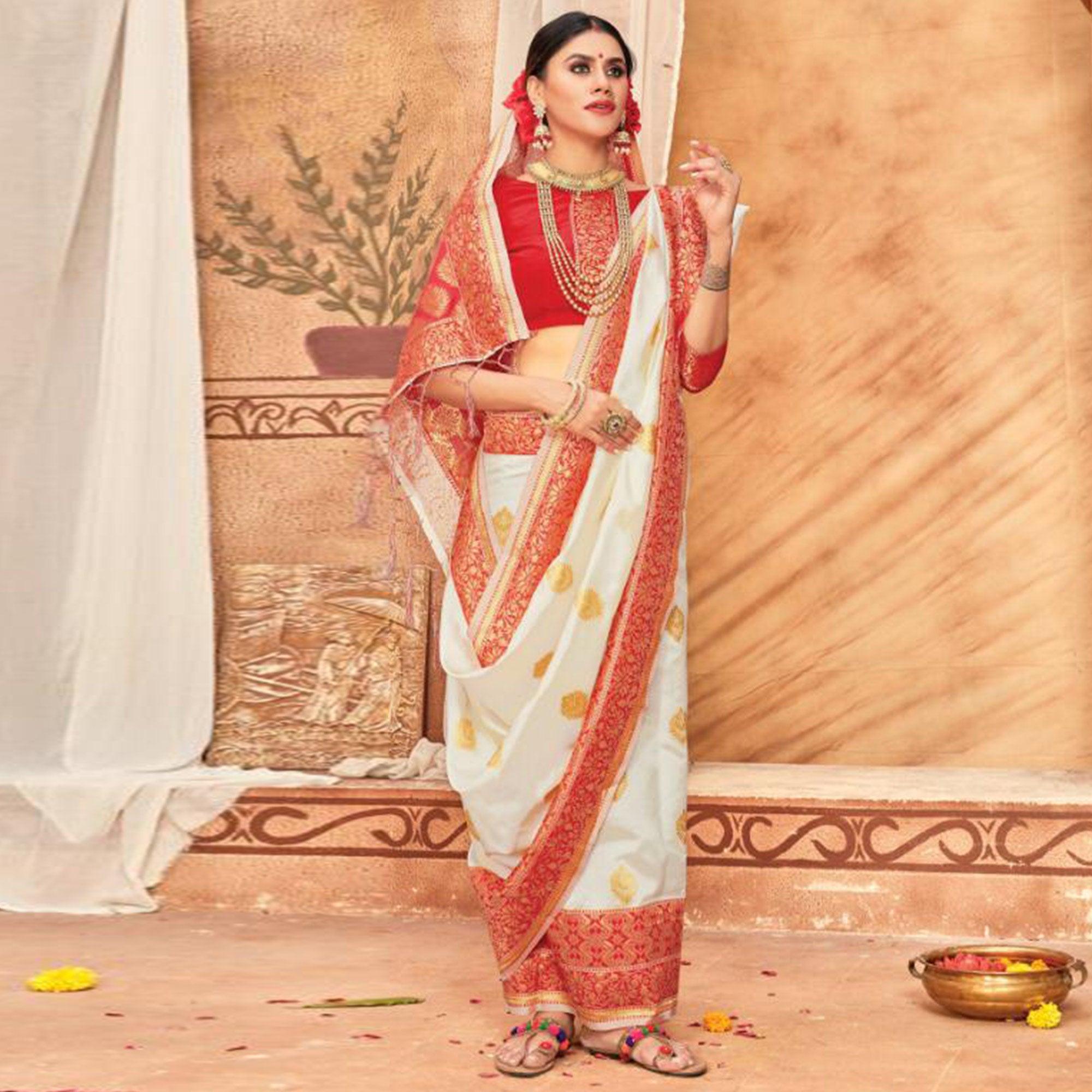 Glowing Cream & Red Colored Festive Wear Woven Silk Blend Saree With Tassels - Peachmode