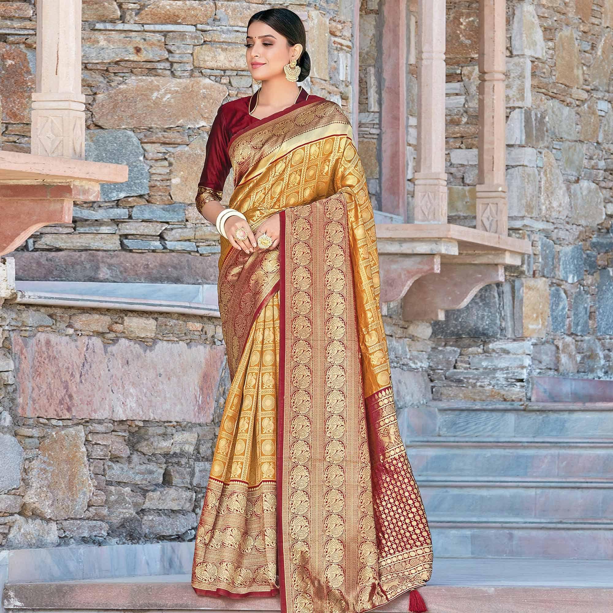 Glowing Golden-Yellow Colored Festive Wear Woven Silk Sareee - Peachmode