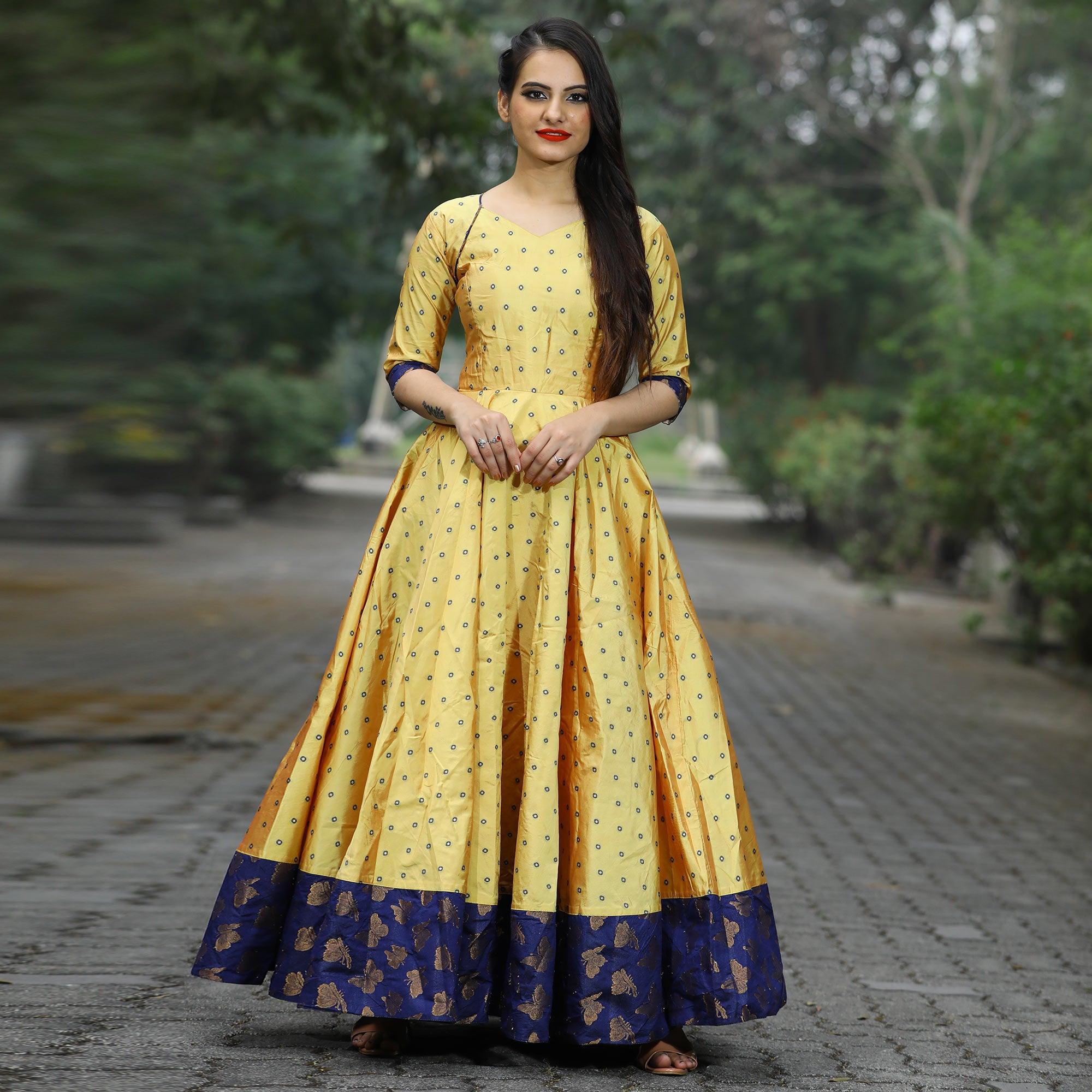 Glowing Light Yellow Colored Partywear Tapetta Gown - Peachmode