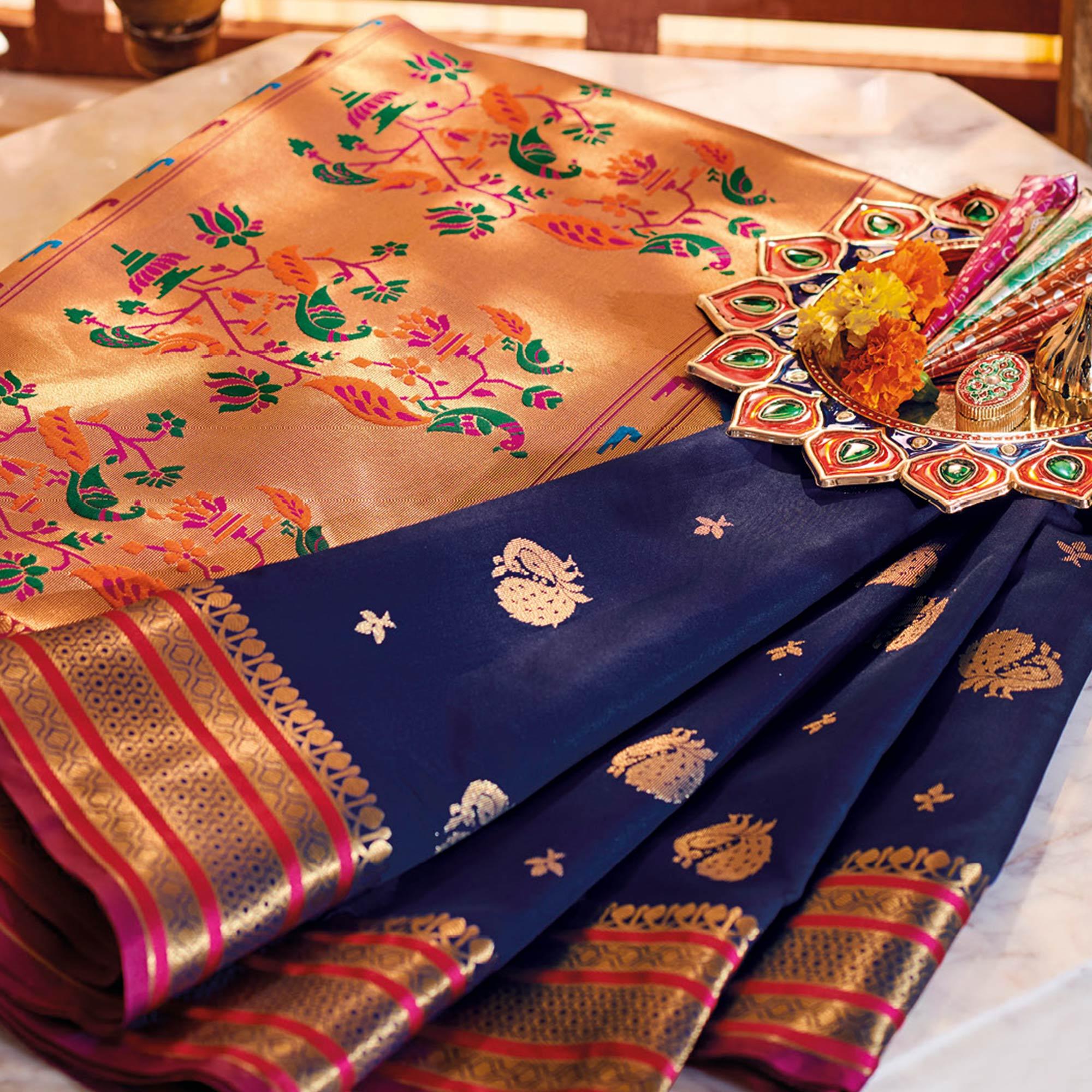 Glowing Navy Blue Colored Festive Wear Woven Silk Saree - Peachmode