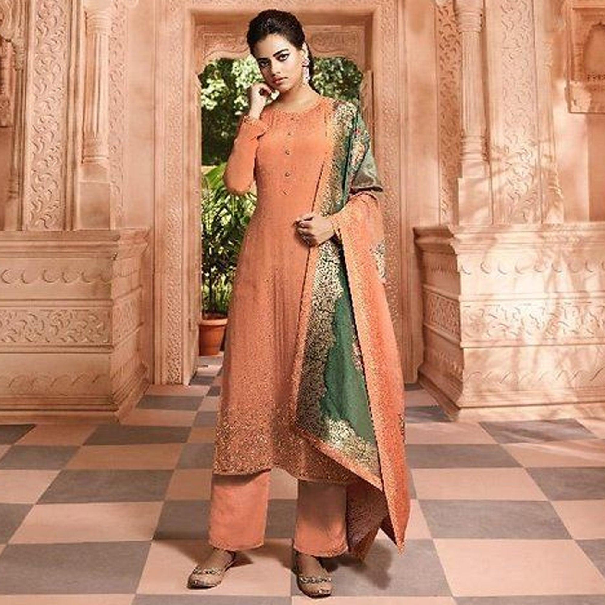 Glowing Orange Colored Partywear Floral Embroidered Satin Crepe Gharara Style Suit - Peachmode