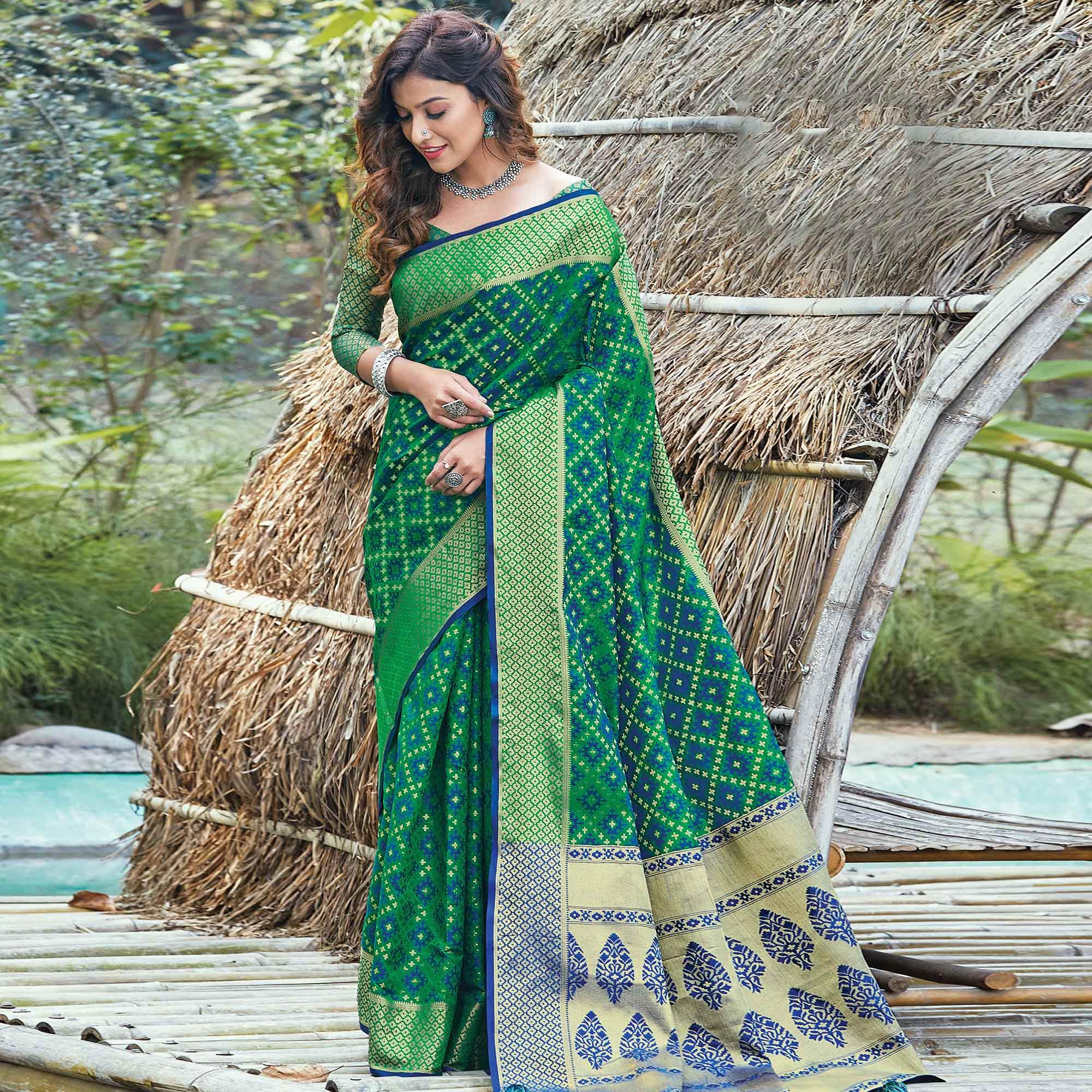Gorgeous Green Colored Festive Wear Patan Patola Silk Saree - Peachmode