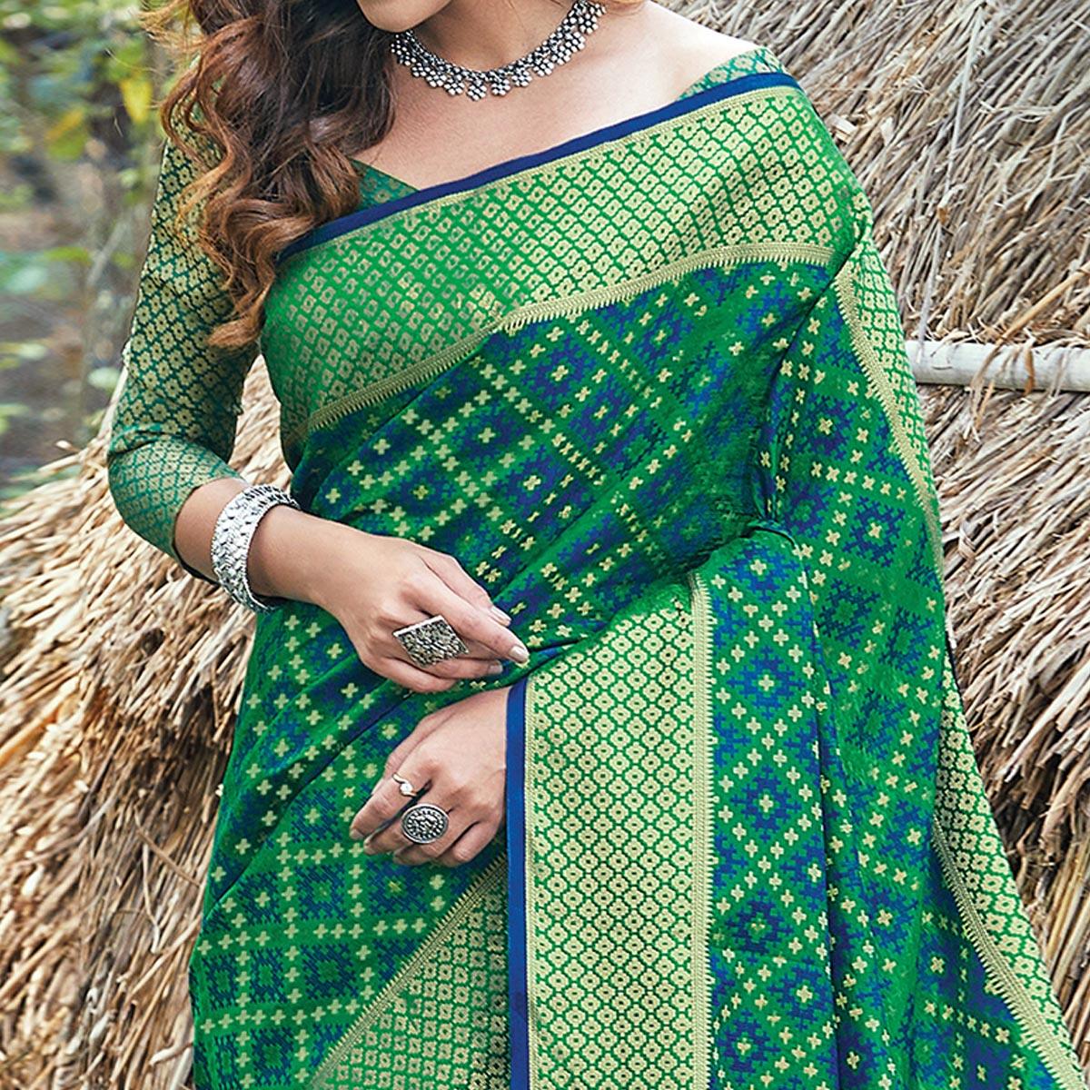 Gorgeous Green Colored Festive Wear Patan Patola Silk Saree - Peachmode