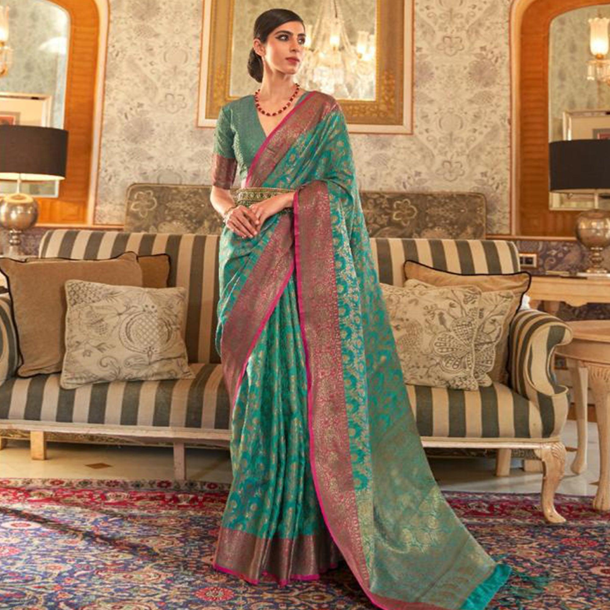 Gorgeous Turquoise Green Colored Festive Wear Woven Silk Saree - Peachmode