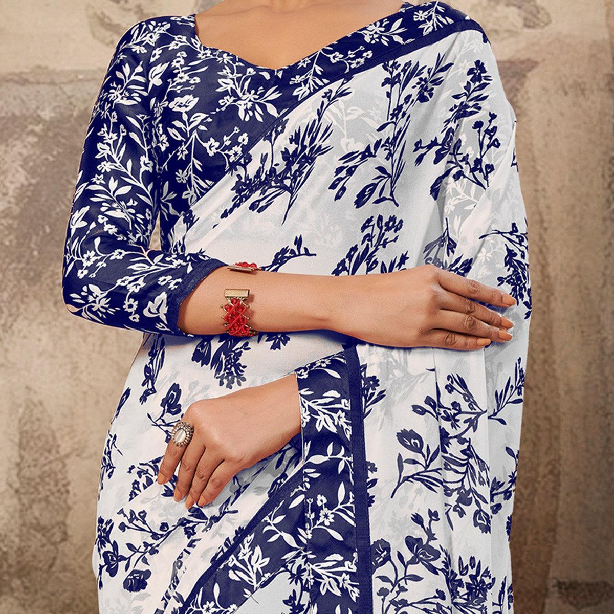 Gorgeous White-Blue Coloured Printed Casual Wear Georgette Saree - Peachmode