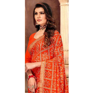 Graceful Orange Colored Festive Wear Bandhani Print With Gotta Border Heavy Georgette Saree - Peachmode