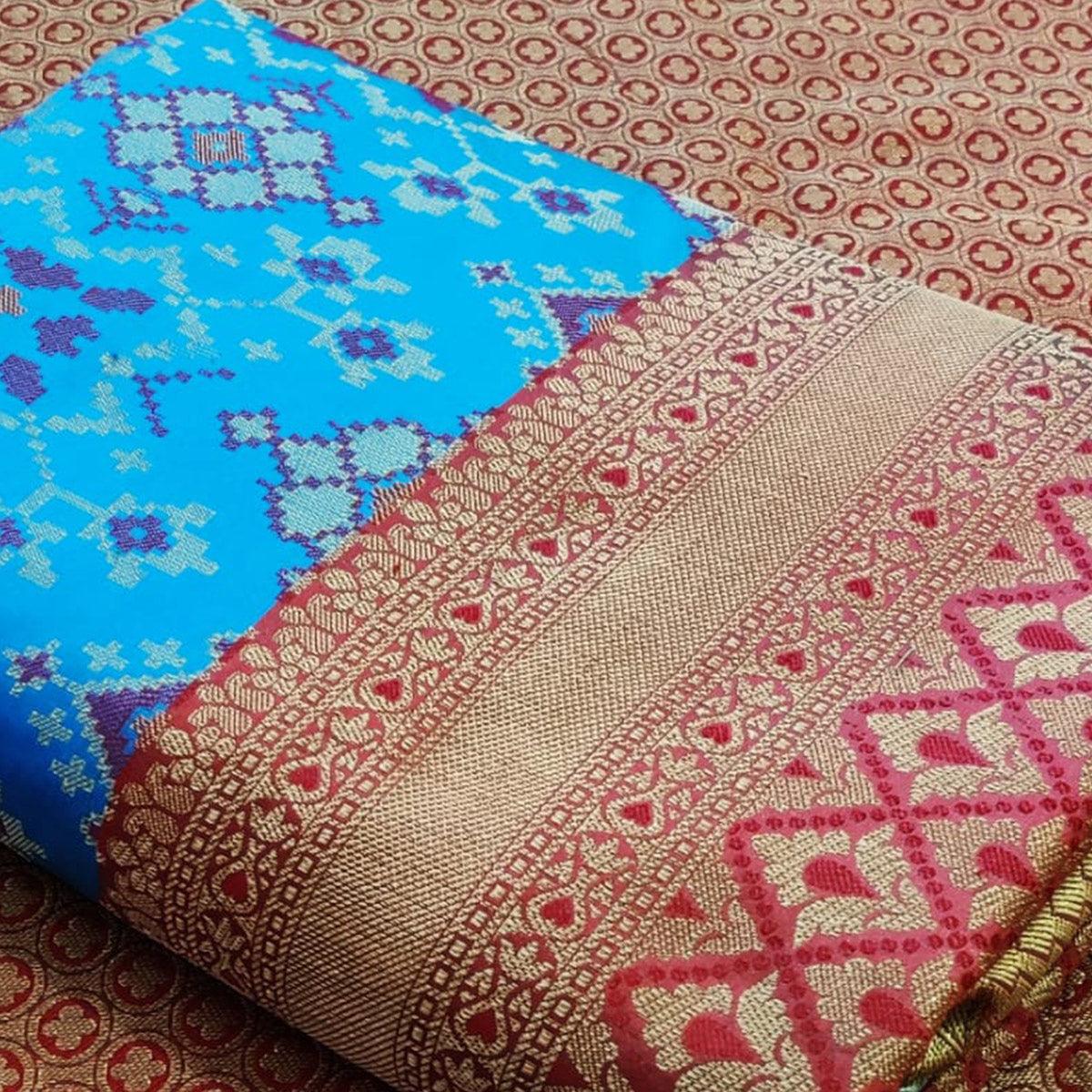 Graceful Sky Blue Colored Festive Wear Woven Patola Silk Saree - Peachmode