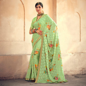 Green Casual Wear Floral Printed Chiffon Saree With Fancy Lace - Peachmode