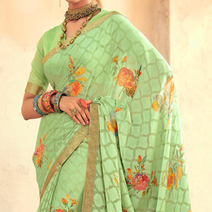 Green Casual Wear Floral Printed Chiffon Saree With Fancy Lace - Peachmode