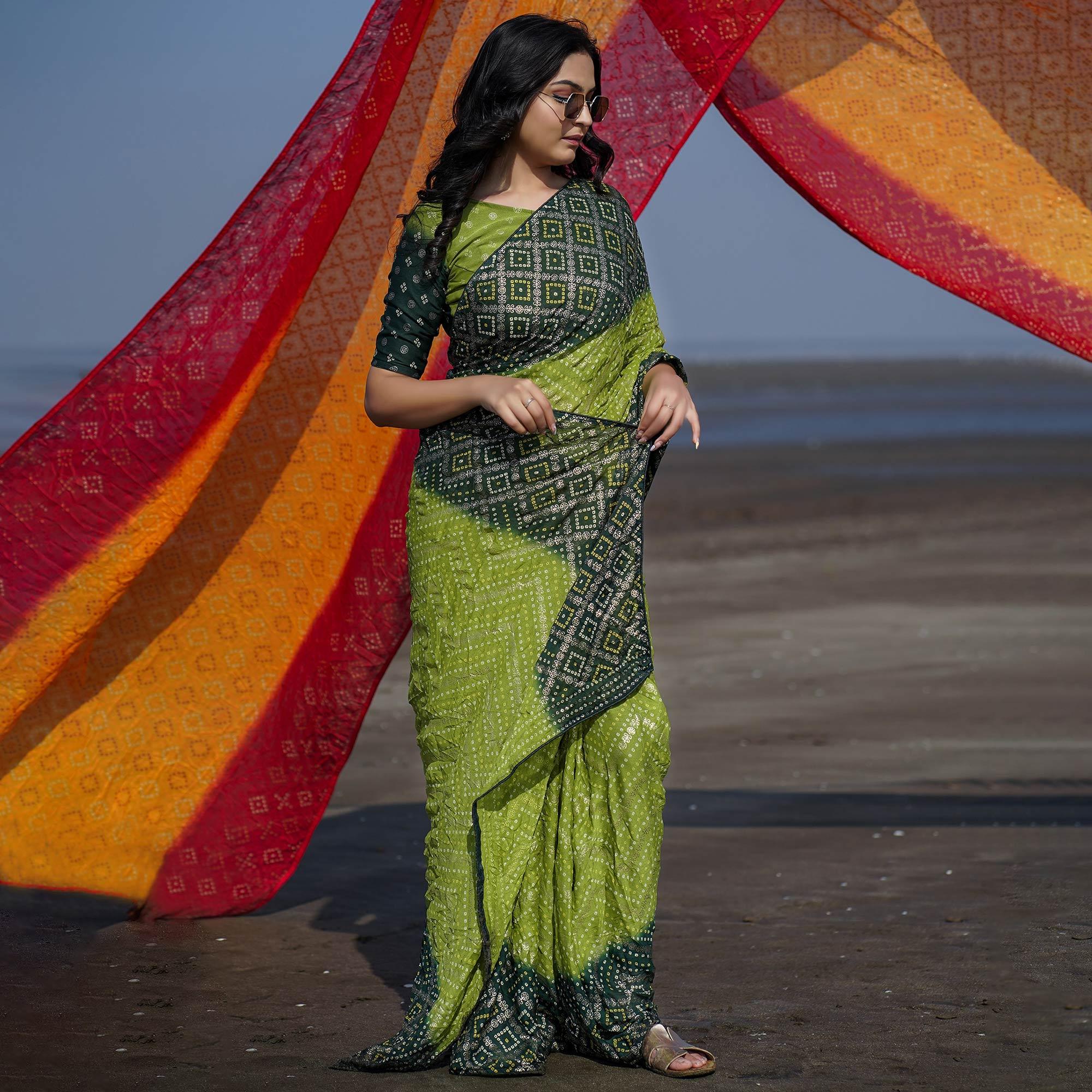 Green Casual Wear Foil Printed Crepe Saree - Peachmode