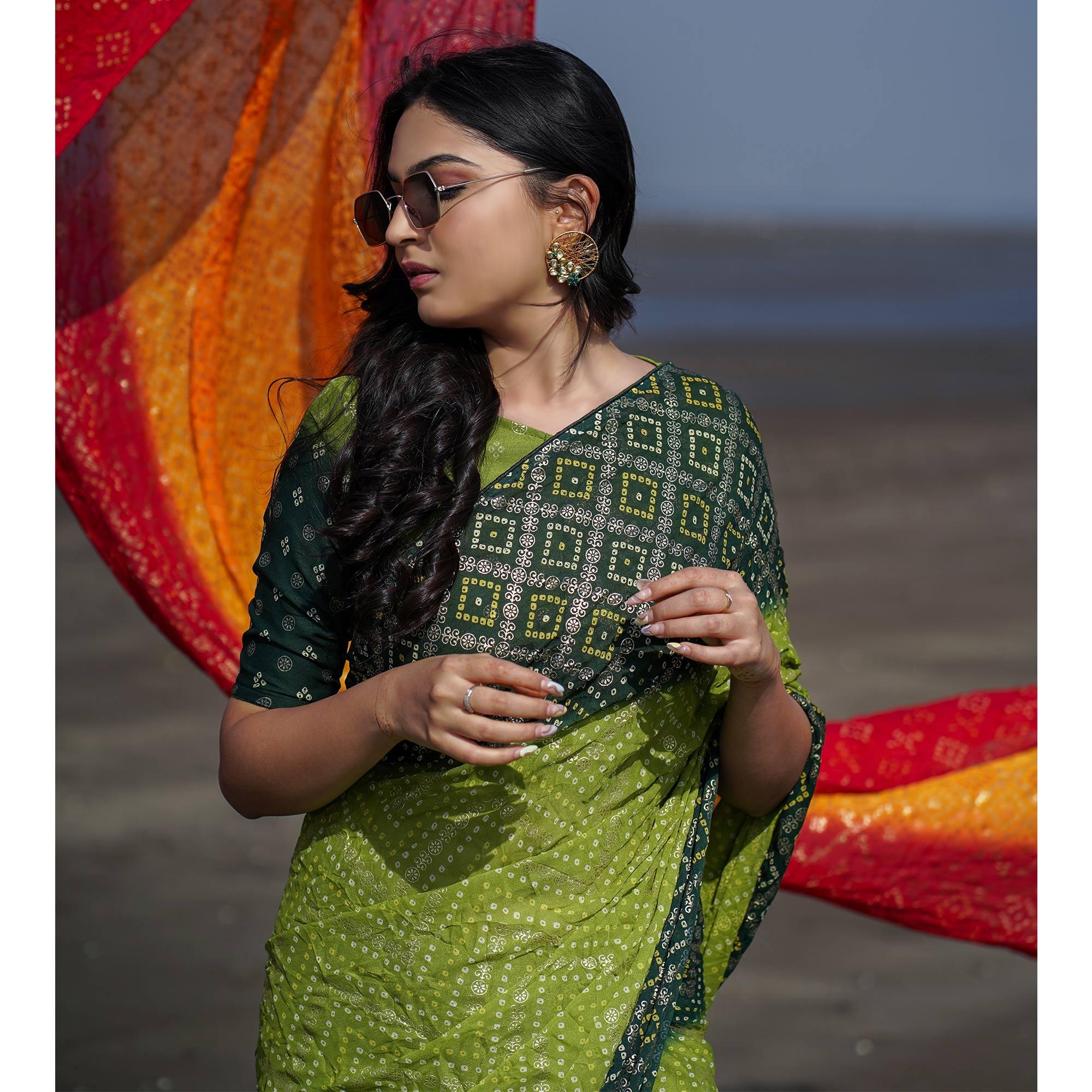 Green Casual Wear Foil Printed Crepe Saree - Peachmode