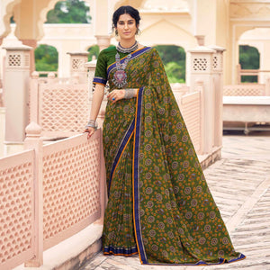 Green Casual Wear Printed Weightless Georgette Saree - Peachmode