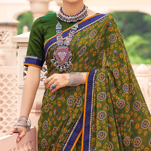 Green Casual Wear Printed Weightless Georgette Saree - Peachmode