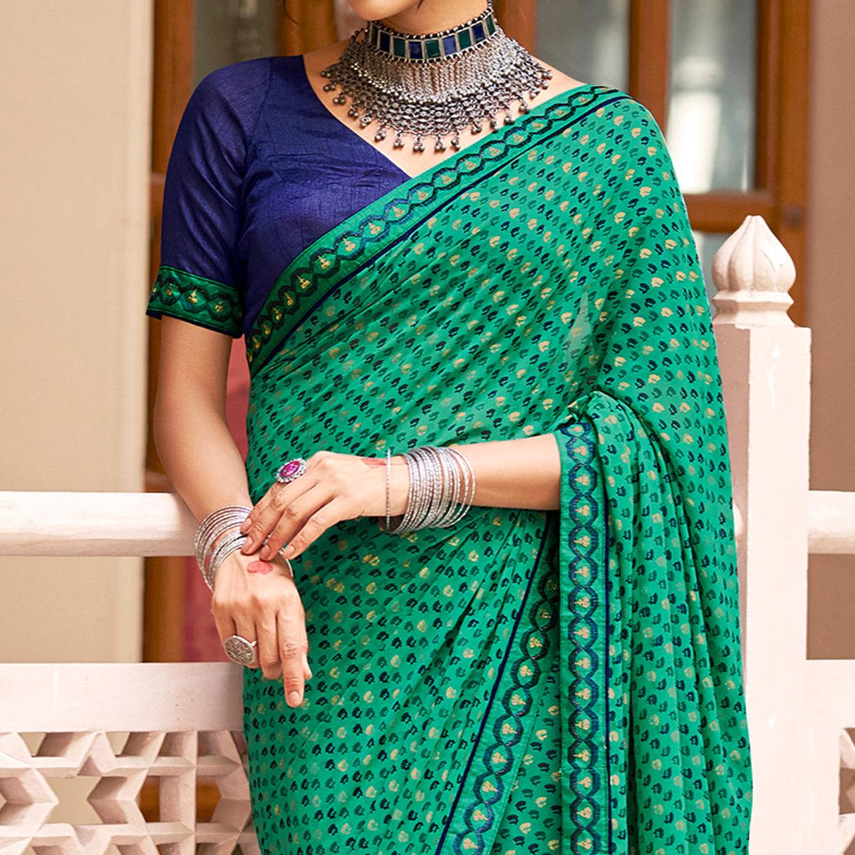 Green Casual Wear Printed Weightless Georgette Saree - Peachmode