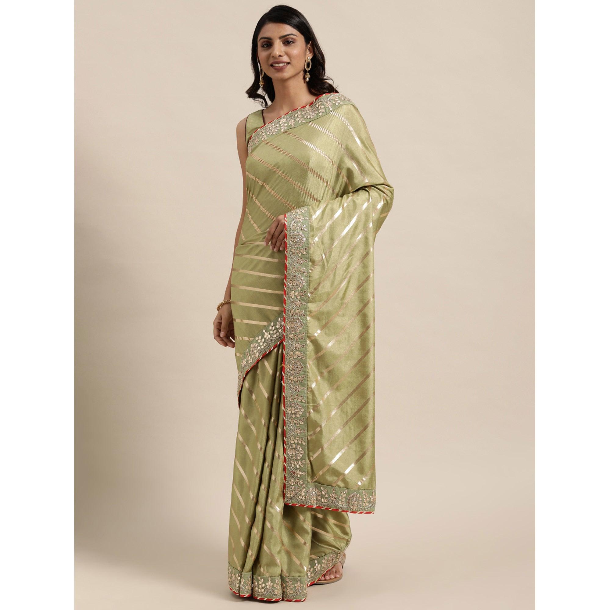 Green Casual Wear Stripes Printed Georgette Saree - Peachmode