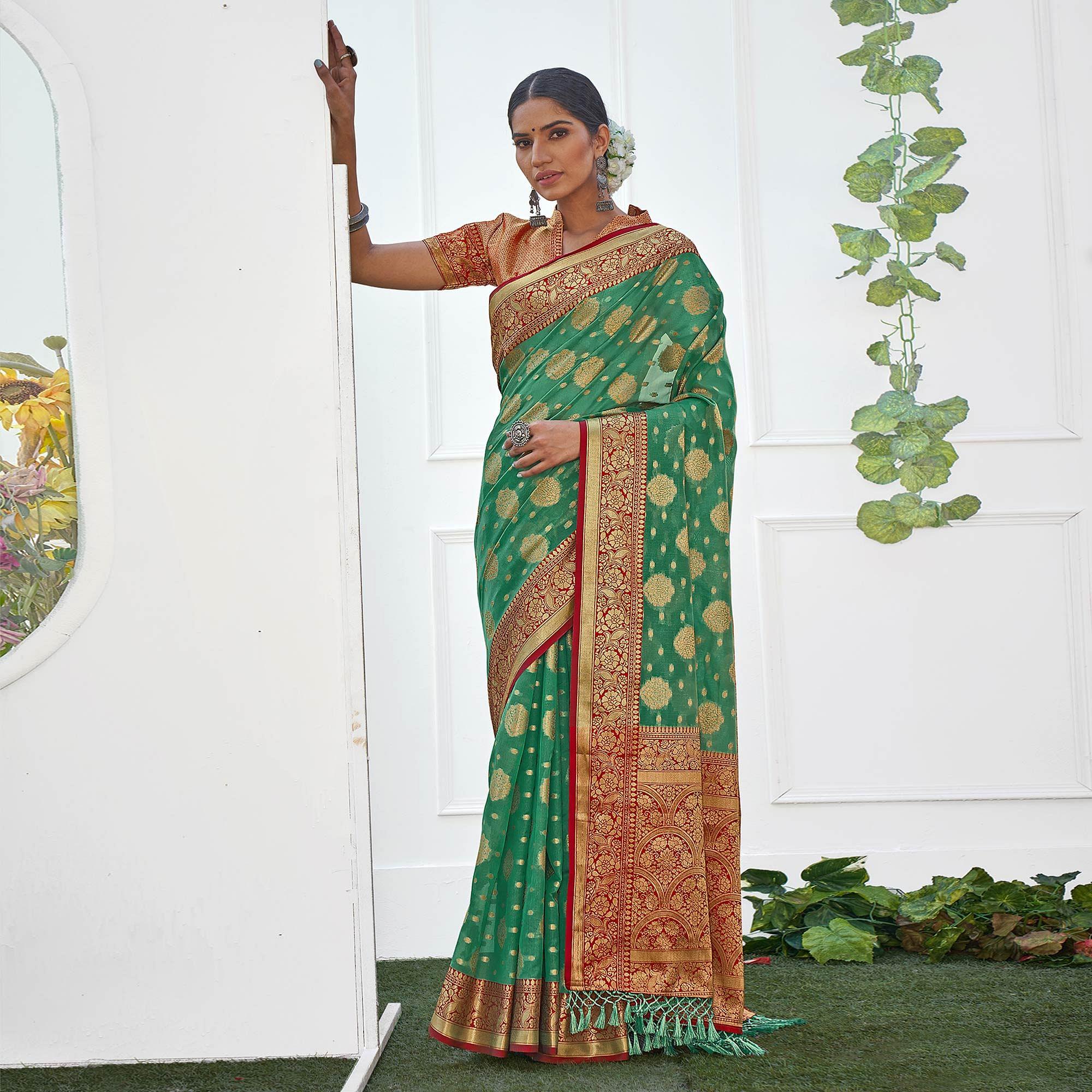 Green Festive Wear Banarasi Woven Organza Saree With Tassels - Peachmode
