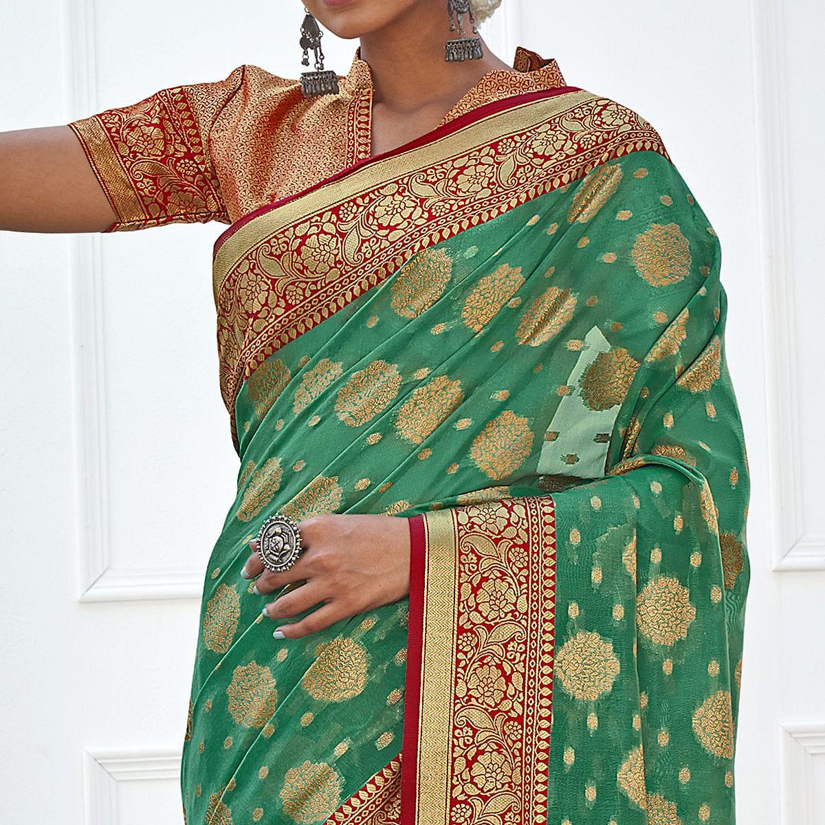Green Festive Wear Banarasi Woven Organza Saree With Tassels - Peachmode
