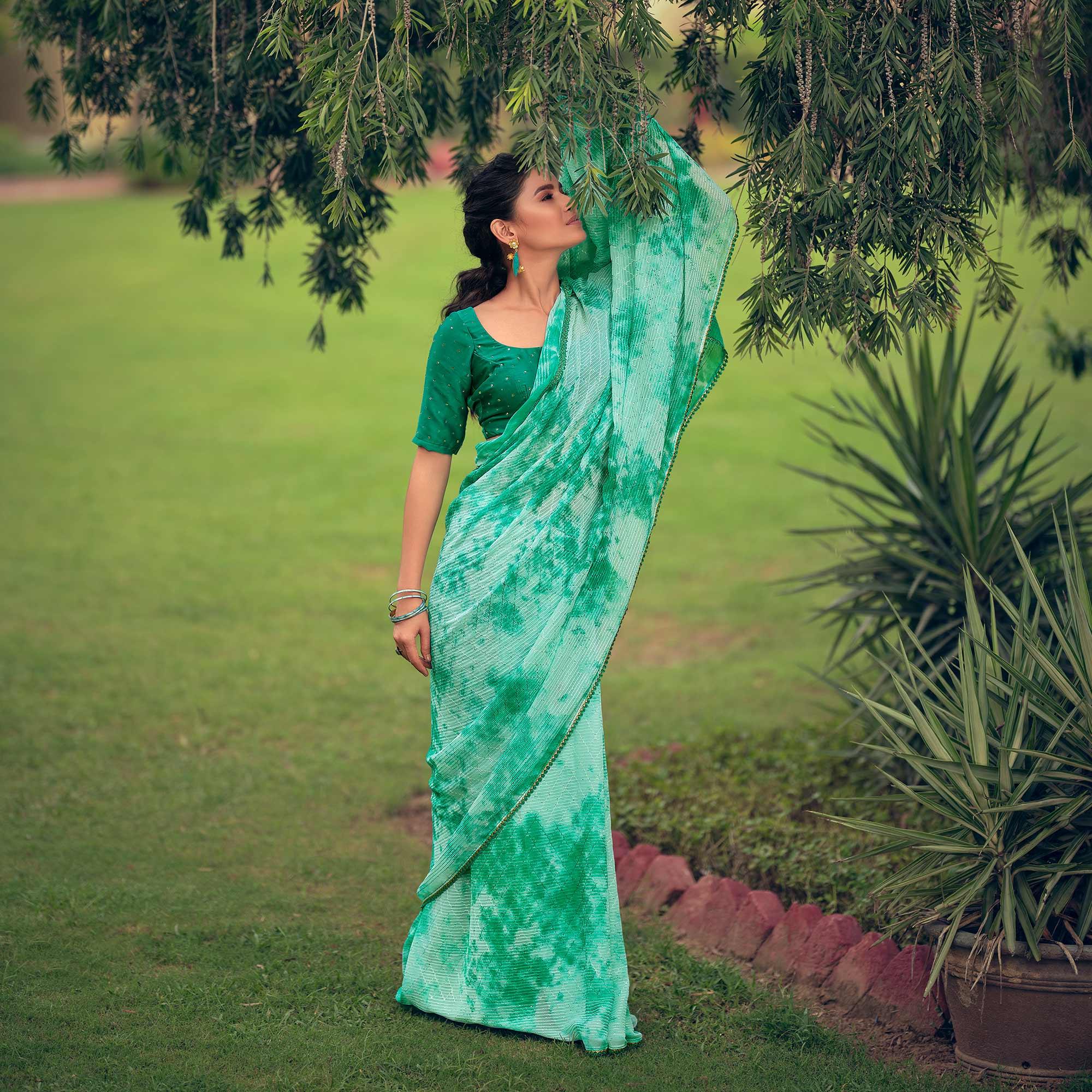 Green Festive Wear Crochet Work Georgette Saree - Peachmode
