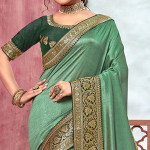 Green Festive Wear Silk Saree With Embroidered Border - Peachmode