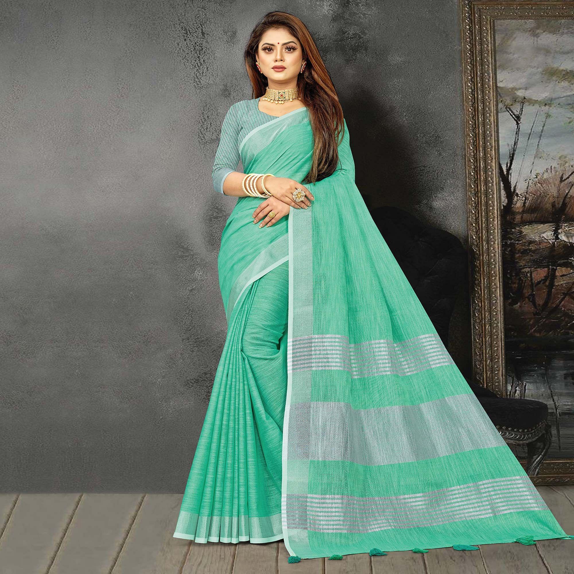 Green Festive Wear Solid Linen Saree - Peachmode