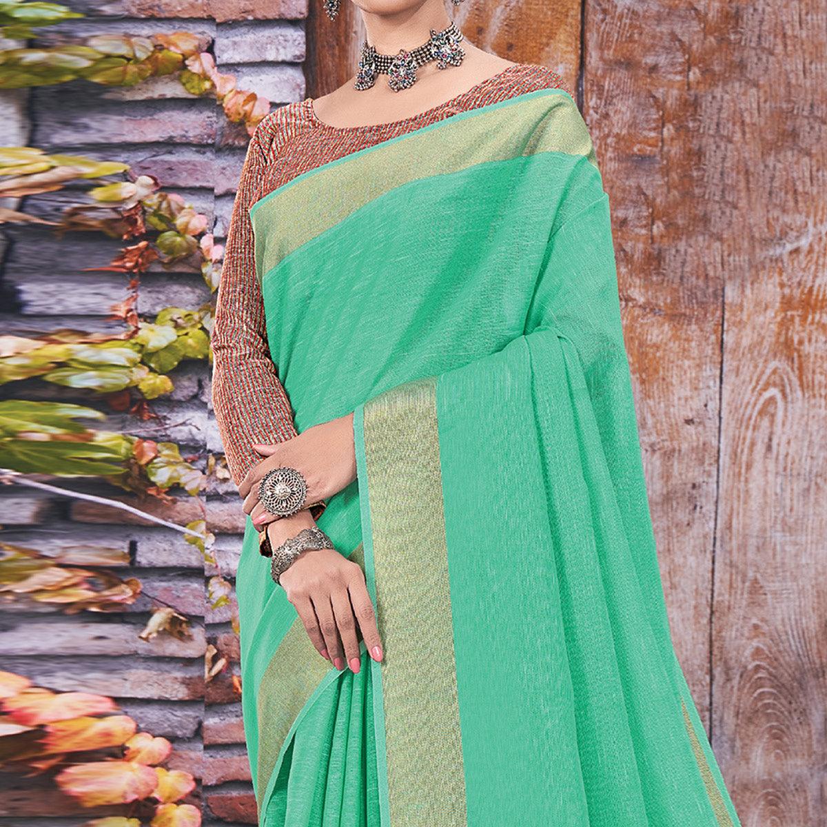 Green Festive Wear Solid Linen Saree - Peachmode
