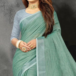 Green Festive Wear Solid Linen Saree - Peachmode