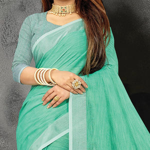 Green Festive Wear Solid Linen Saree - Peachmode