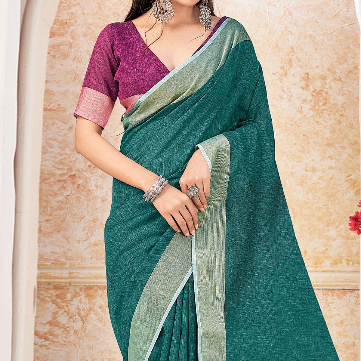 Green Festive Wear Solid Linen Saree - Peachmode