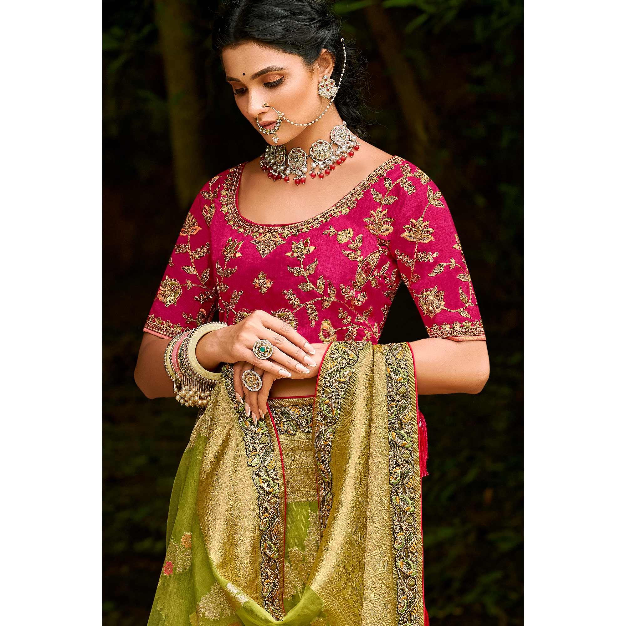 Green Festive Wear Woven & Embroidered Organza Saree - Peachmode