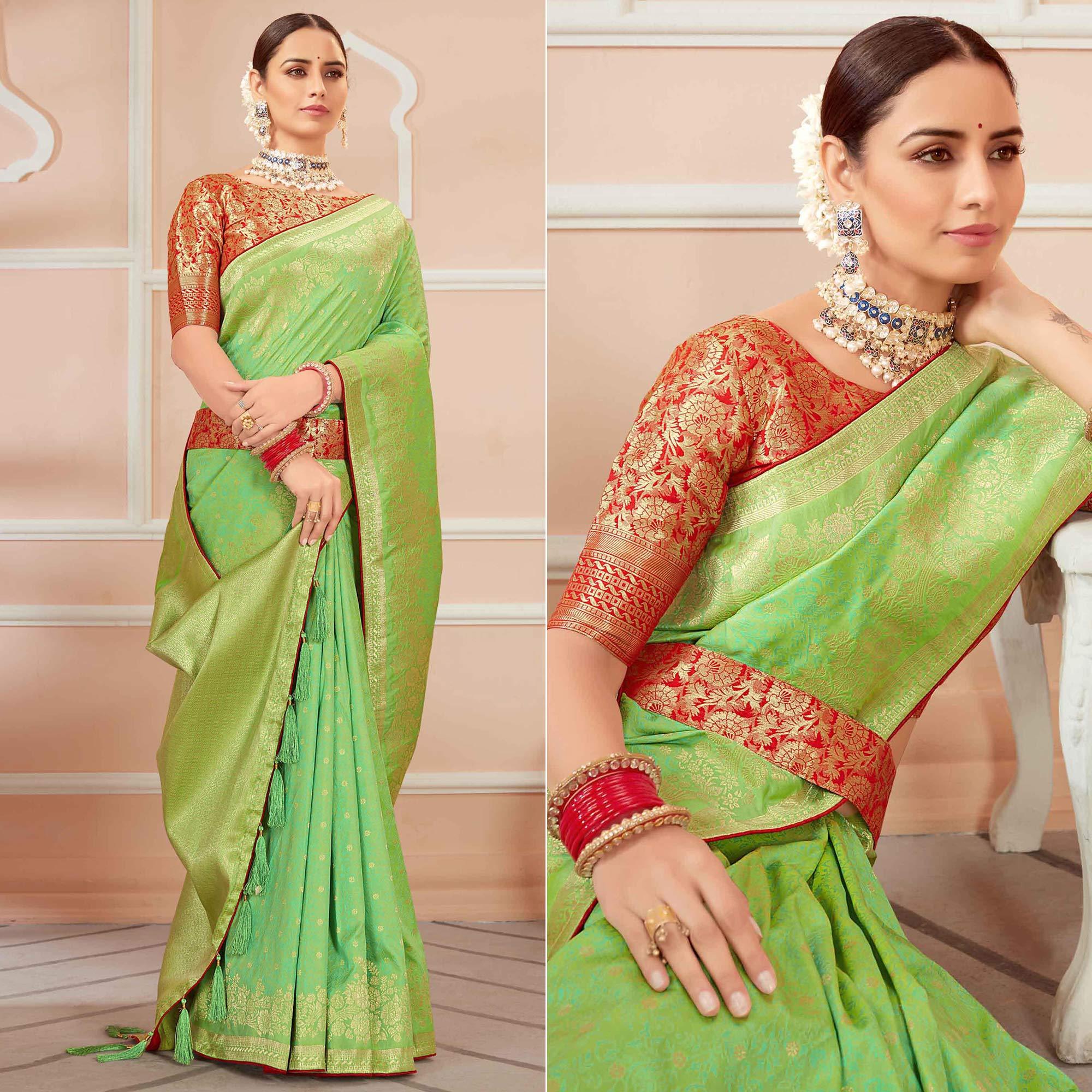 Green Festive Wear Woven Banarasi Silk Saree With Tassels - Peachmode