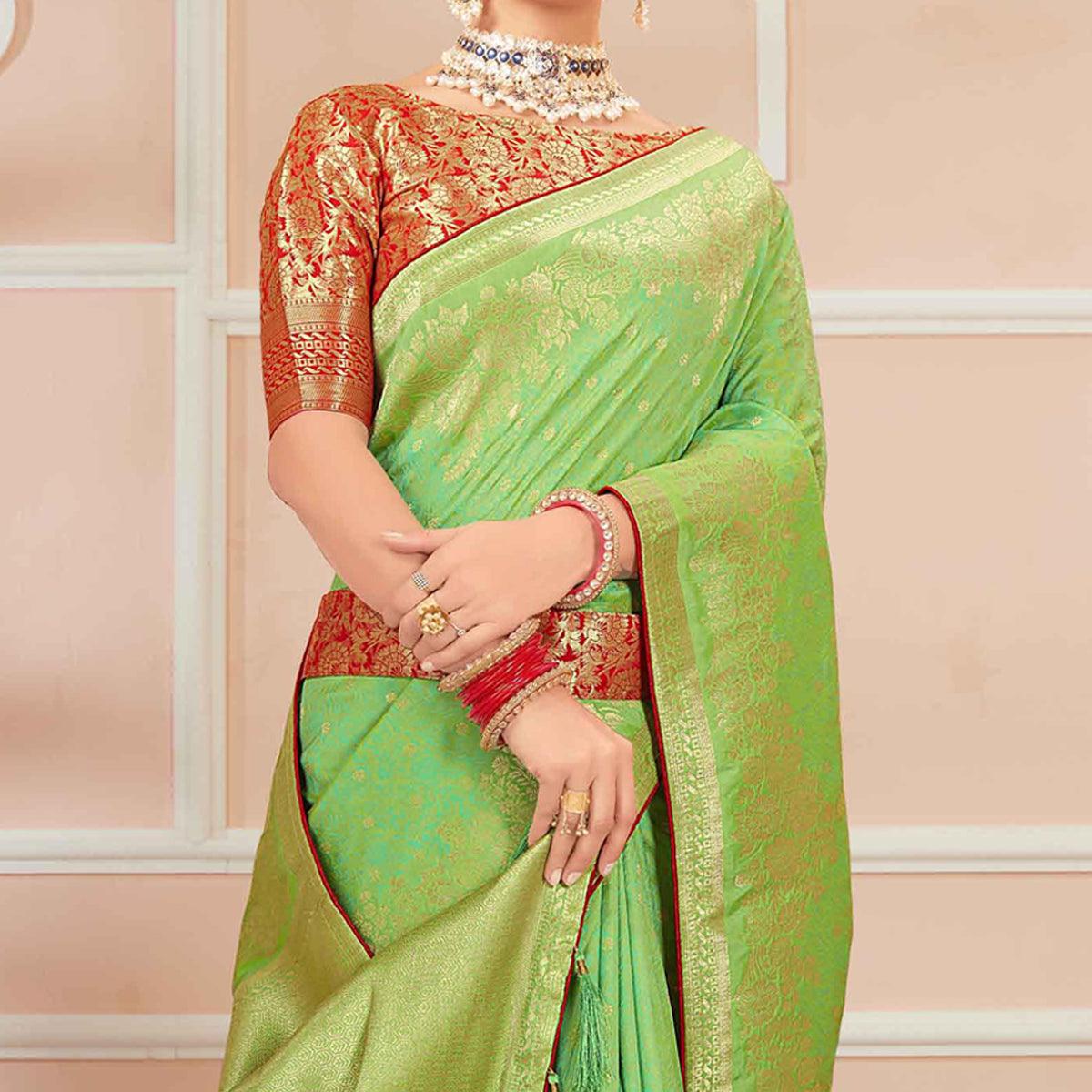 Green Festive Wear Woven Banarasi Silk Saree With Tassels - Peachmode