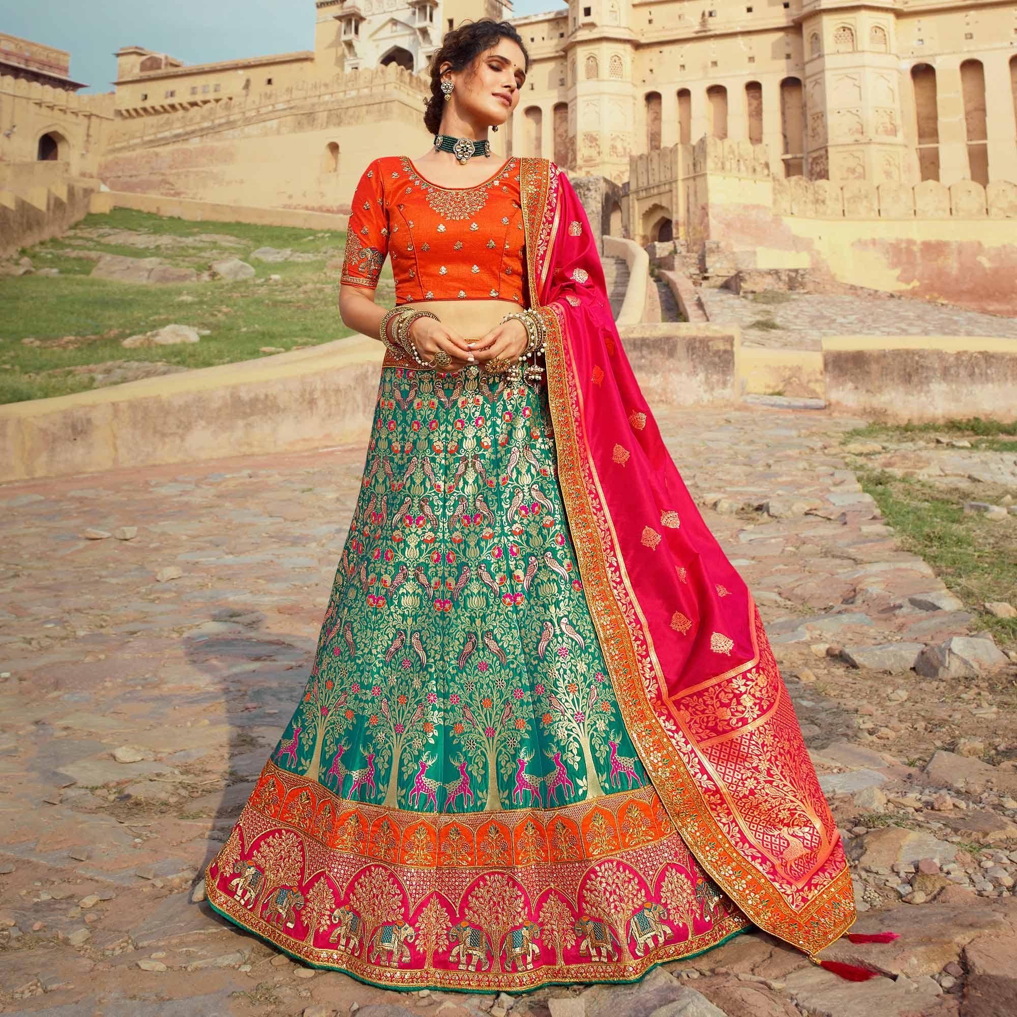 Green Festive Wear Woven Heavy Banarasi Silk Lehenga Choli - Peachmode