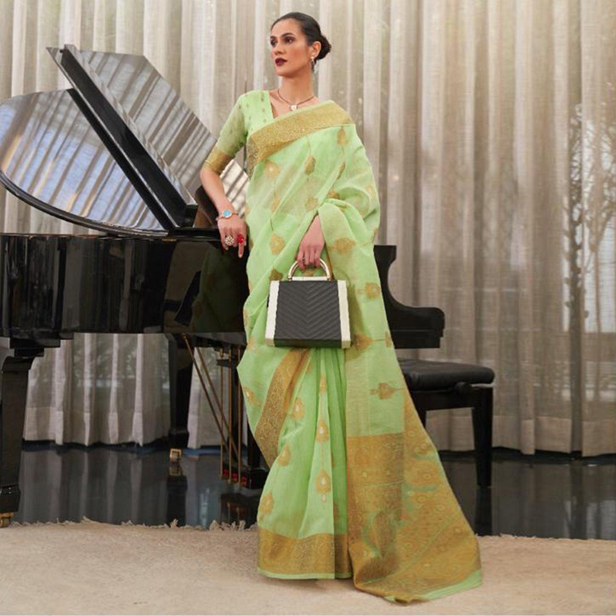 Green Festive Wear Woven Linen Saree - Peachmode