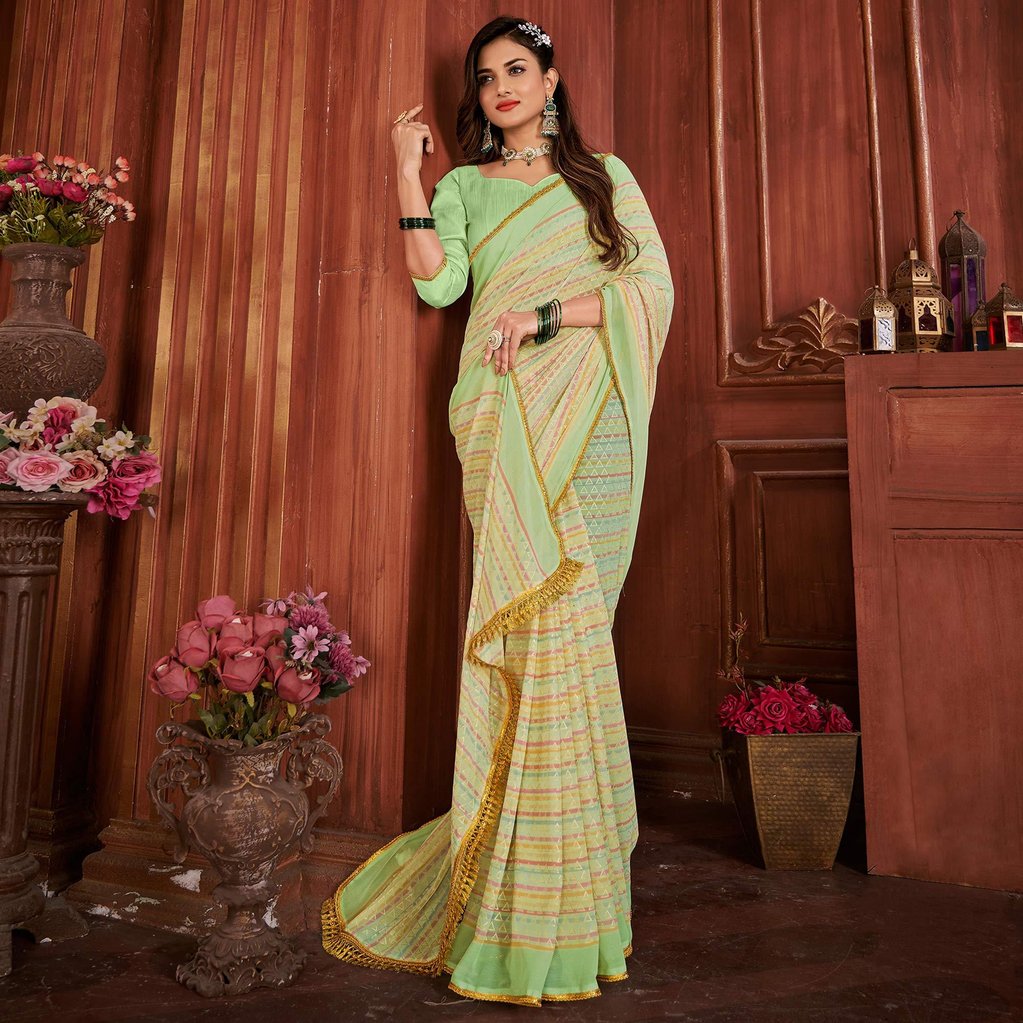 Green Foil Printed Georgette Saree - Peachmode