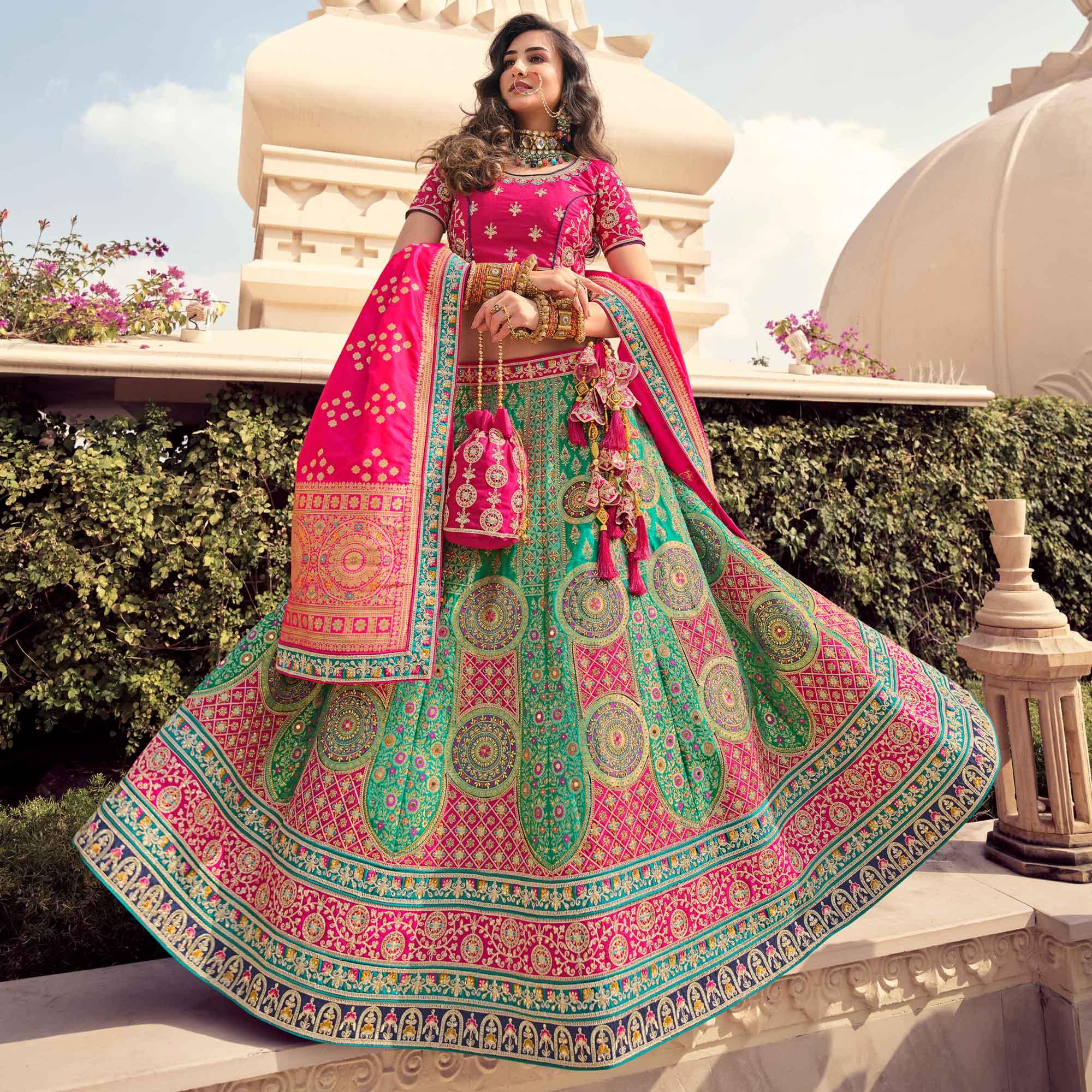 Green Partywear Embellished Embroidered Banarasi Silk Lehenga - Peachmode