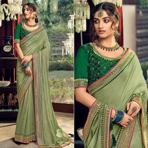 Green Partywear Embroidered Silk Saree - Peachmode
