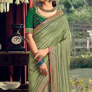 Green Partywear Embroidered Silk Saree - Peachmode